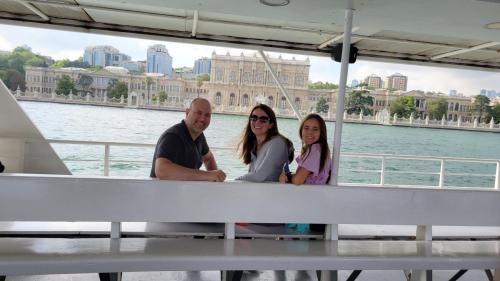 A ferry ride across the Bosporus passing by the palace we just toured